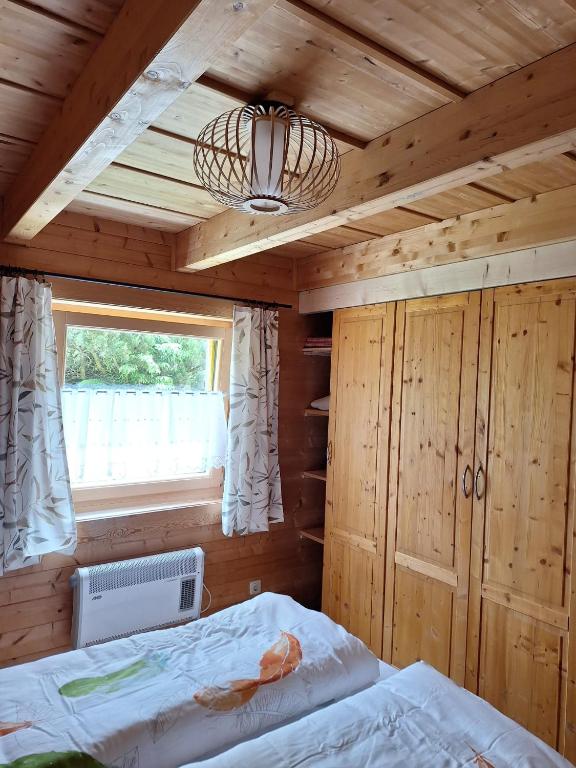 Postel nebo postele na pokoji v ubytování Chalet Siebenschläfer