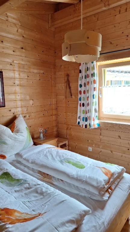 Postel nebo postele na pokoji v ubytování Chalet Siebenschläfer