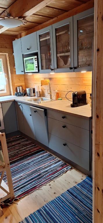 Kuchyň nebo kuchyňský kout v ubytování Chalet Siebenschläfer