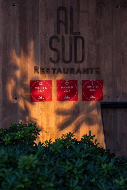 a sign that reads all sub restaurant on a wall at Palmares Beach House Hotel - Adults Only in Lagos