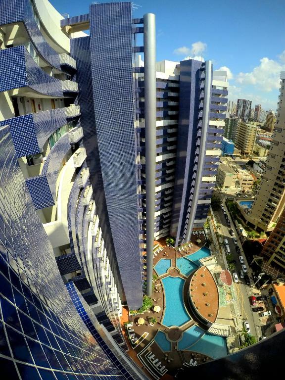 an aerial view of a tall building in a city at Beach Class by Solemar in Fortaleza