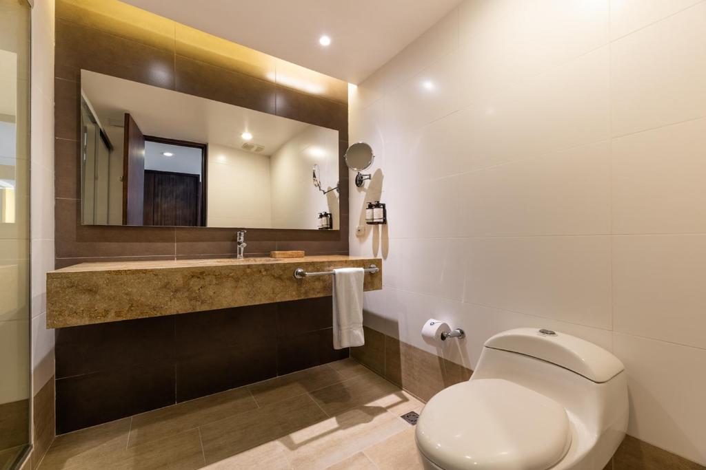 Ванная комната в Hotel Estelar Milla De Oro