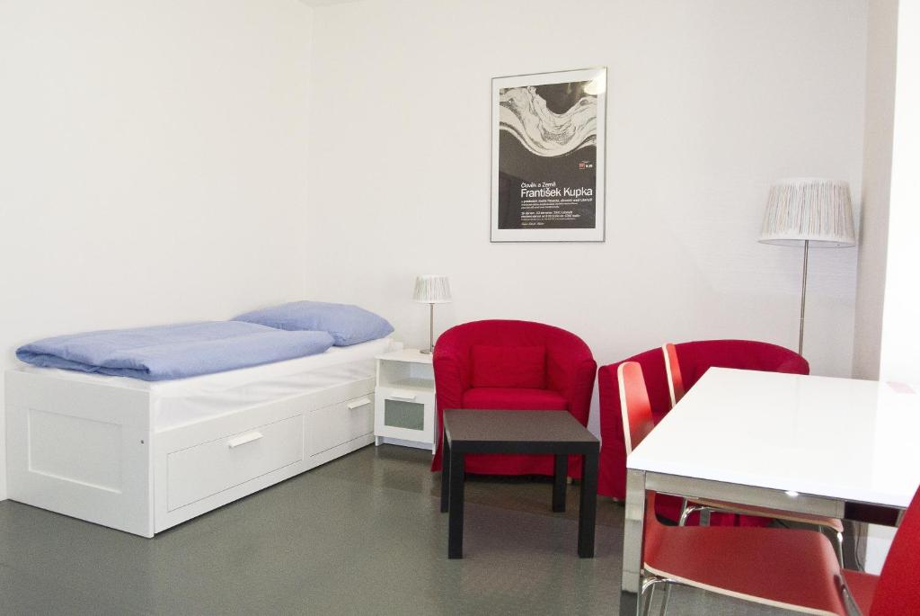 Postel nebo postele na pokoji v ubytování Zámecký Hotel Litomyšl