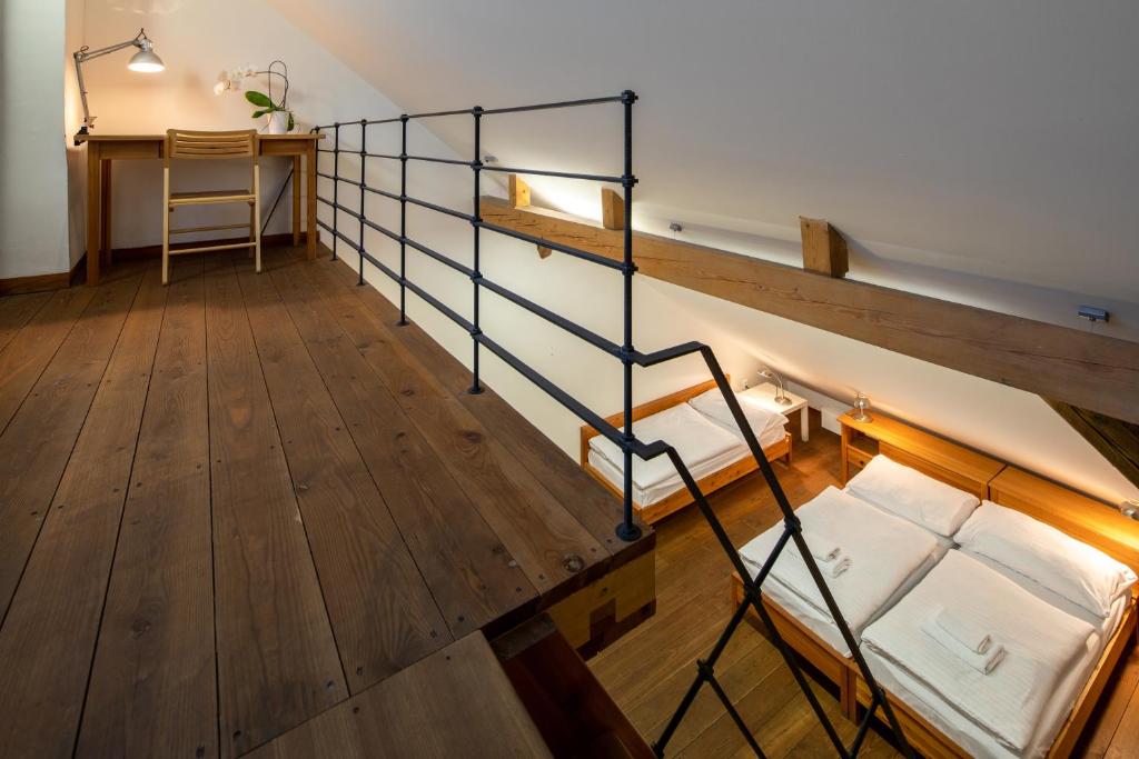 Postel nebo postele na pokoji v ubytování Zámecký Hotel Litomyšl