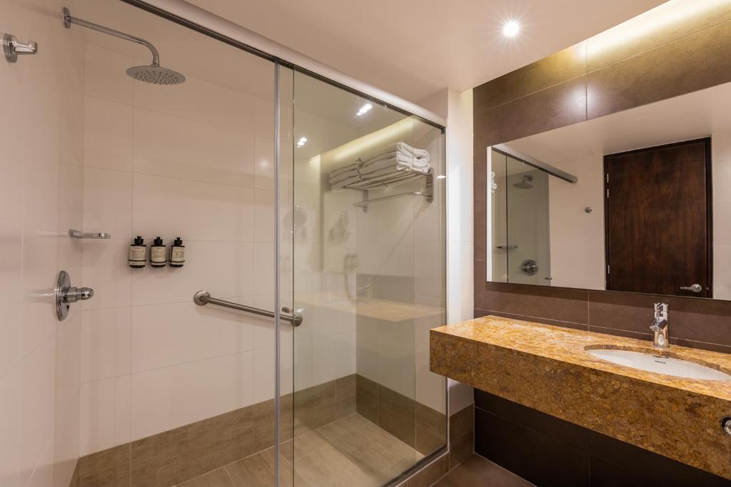 Ванная комната в Hotel Estelar Milla De Oro