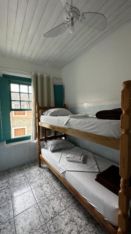Postel nebo postele na pokoji v ubytování Pousada Manjericão