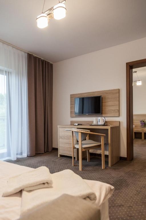 Postel nebo postele na pokoji v ubytování Sunset Spa