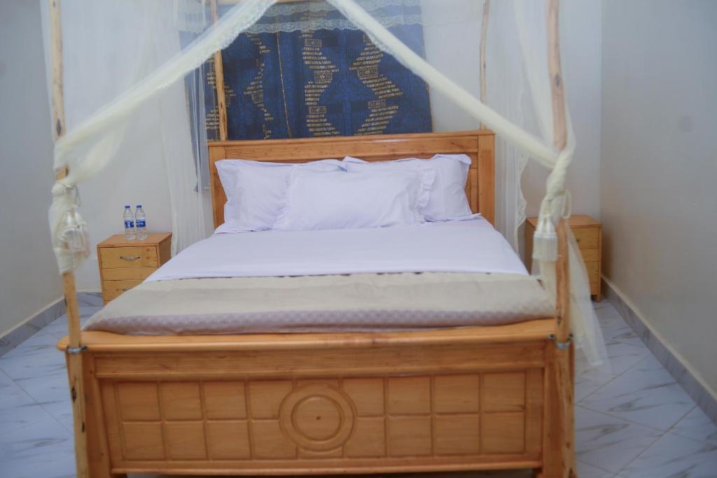Postel nebo postele na pokoji v ubytování Chabrees Residence