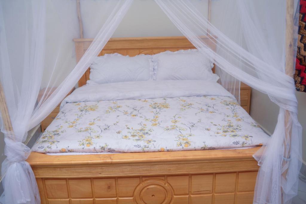 Postel nebo postele na pokoji v ubytování Chabrees Residence