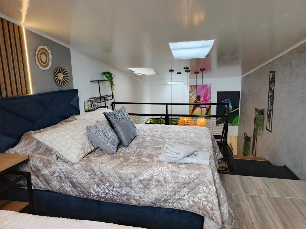 Postel nebo postele na pokoji v ubytování Hope Aparta Lofts