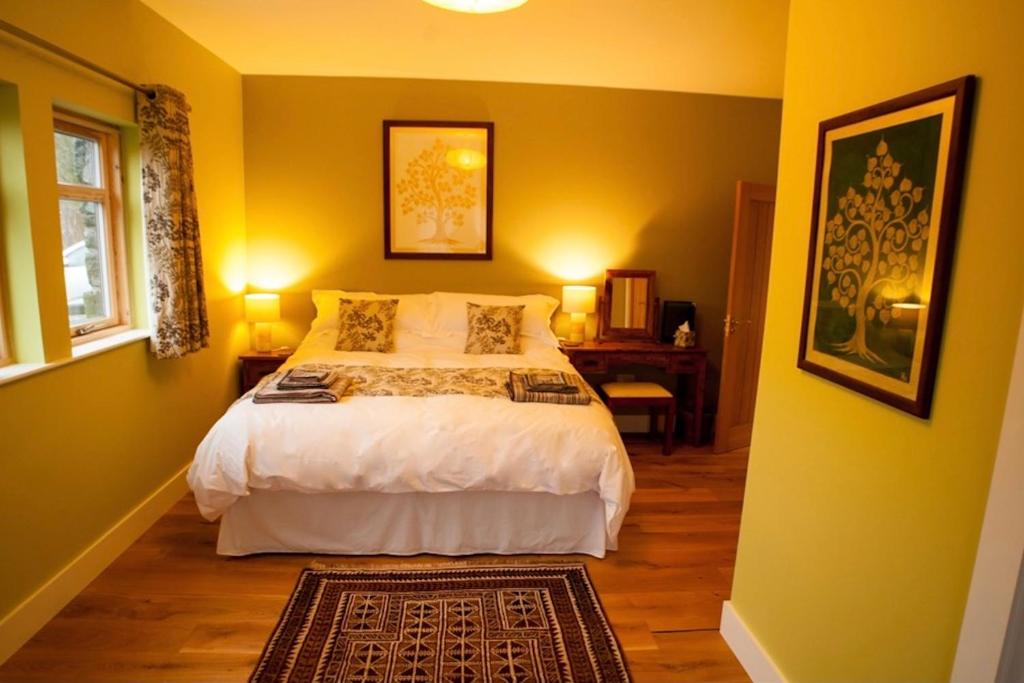 Postel nebo postele na pokoji v ubytování Ceo Mara Croft b&b & 2 luxury Cabins