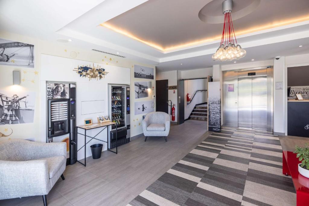 Posezení v ubytování Best Western Saint Exupéry Eysines - Bordeaux Ouest
