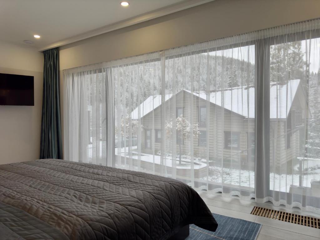 Postel nebo postele na pokoji v ubytování Shypit Spa&Resort