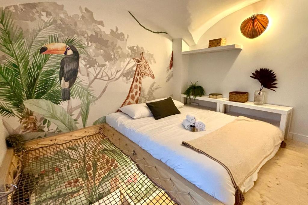 Postel nebo postele na pokoji v ubytování The Jungle - Superbe appartement au coeur de Lyon !