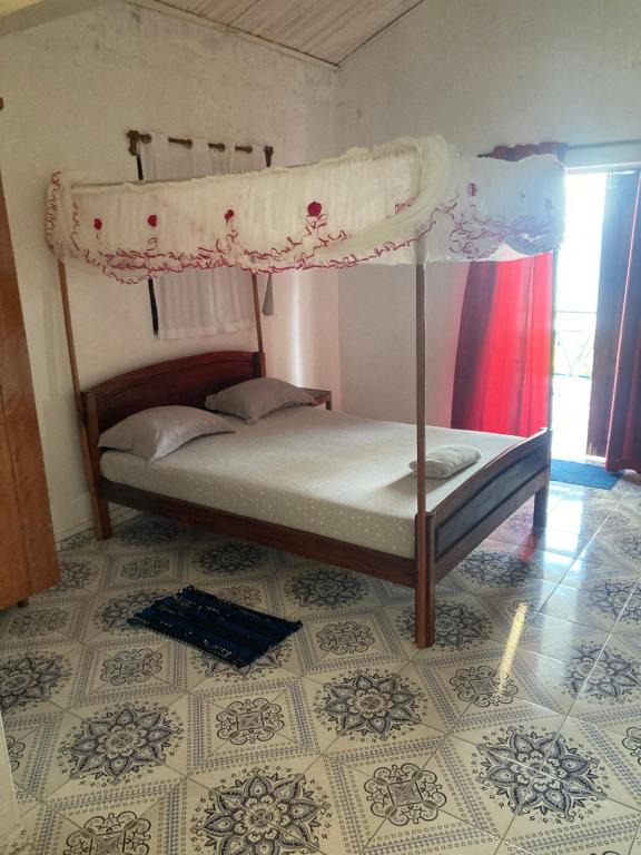 Giường trong phòng chung tại Villa Francisca