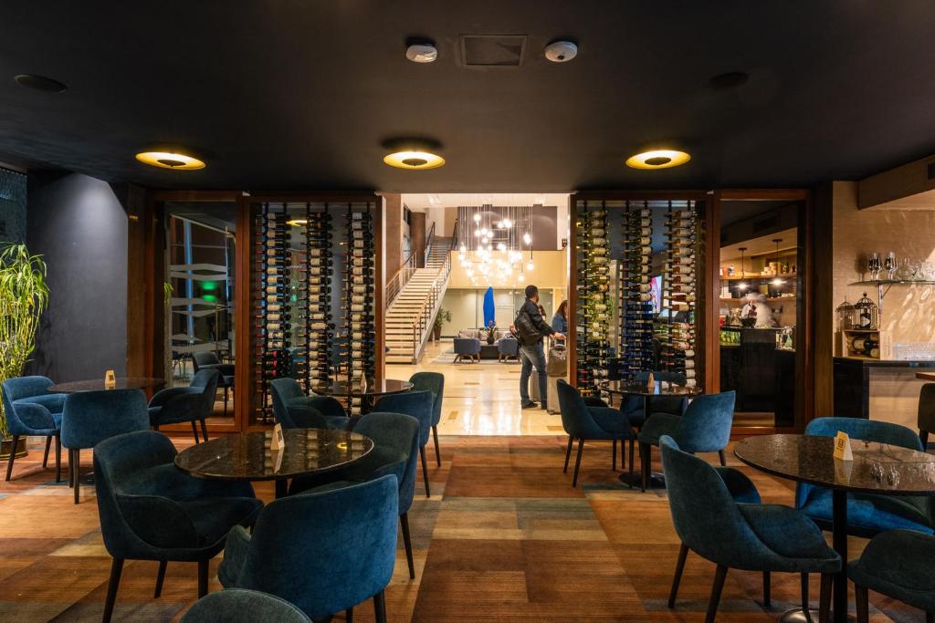 Гостиная зона в Hotel Estelar Milla De Oro