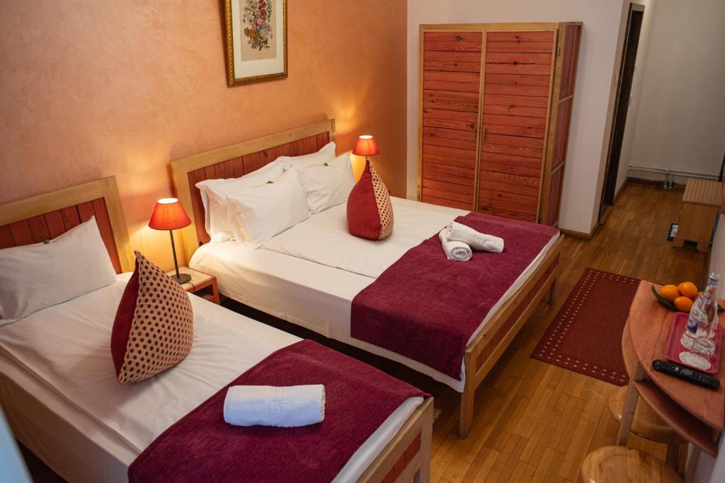 Postel nebo postele na pokoji v ubytování Villa Ermitage