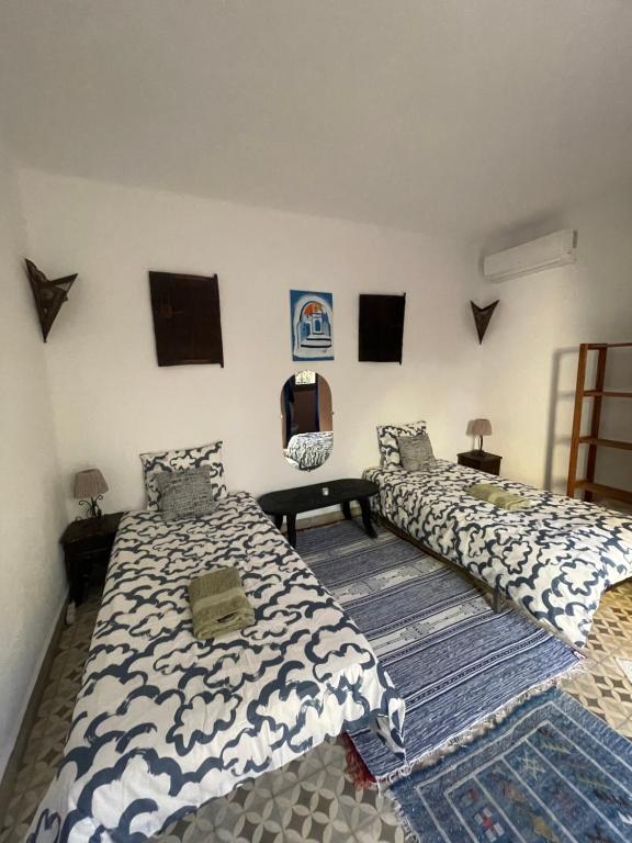 Postel nebo postele na pokoji v ubytování Studio Verde Dar Domingo