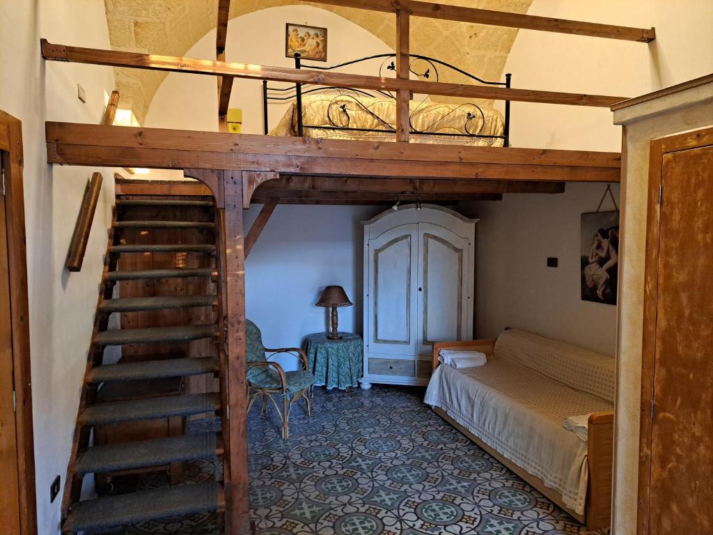 Postel nebo postele na pokoji v ubytování casa vacanze Filomena