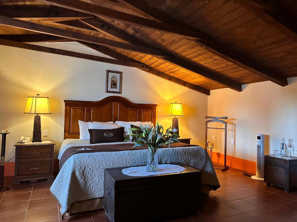 Postel nebo postele na pokoji v ubytování Santa Elena Hotel Boutique