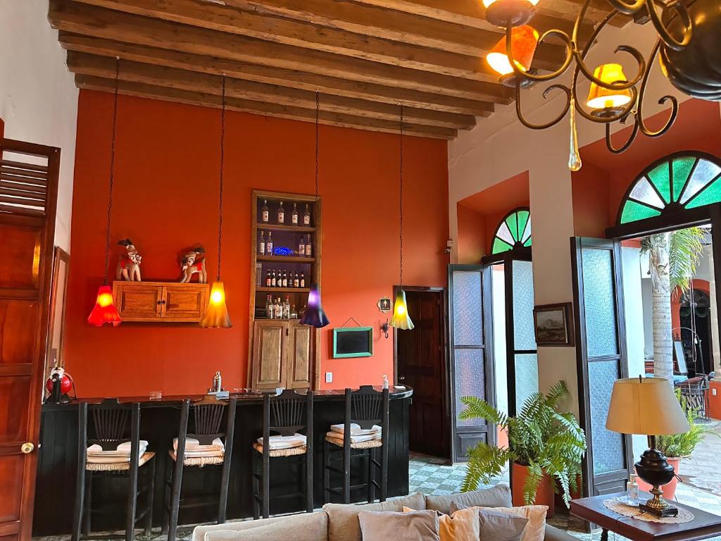 TV a/nebo společenská místnost v ubytování Santa Elena Hotel Boutique