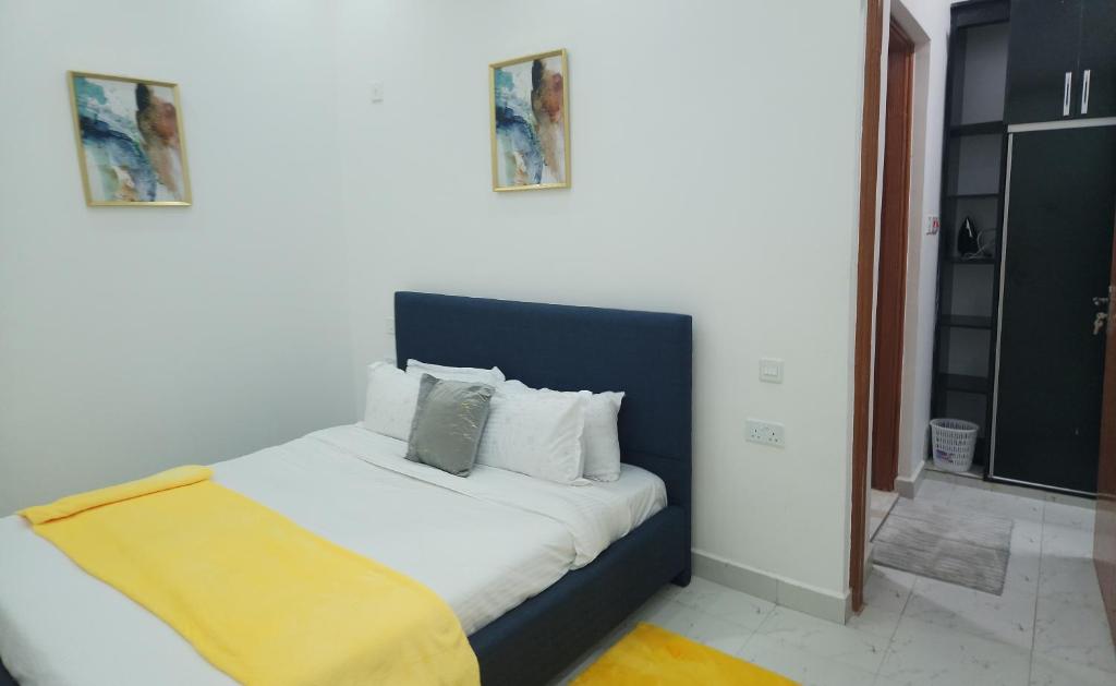 Postel nebo postele na pokoji v ubytování Elysian Homes Villa Naivasha