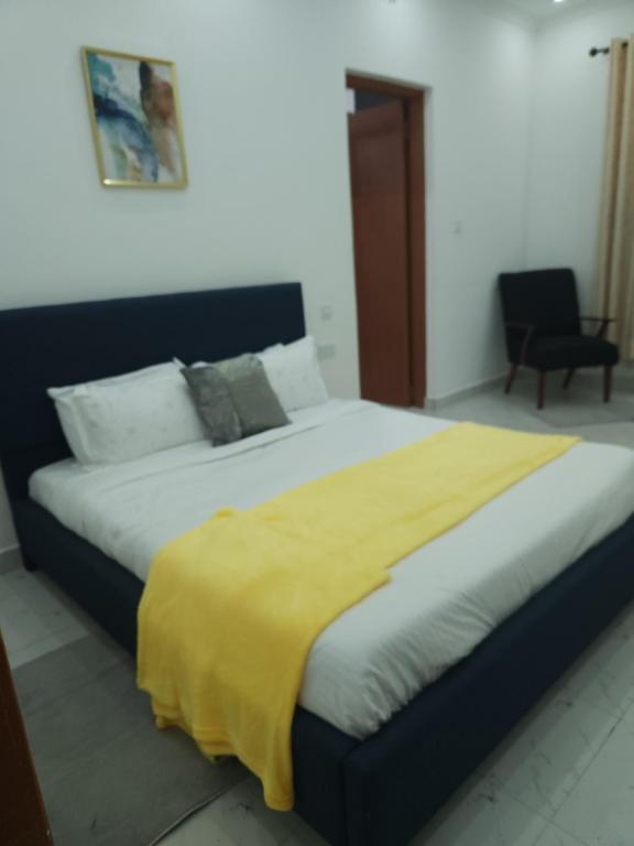 Postel nebo postele na pokoji v ubytování Elysian Homes Villa Naivasha