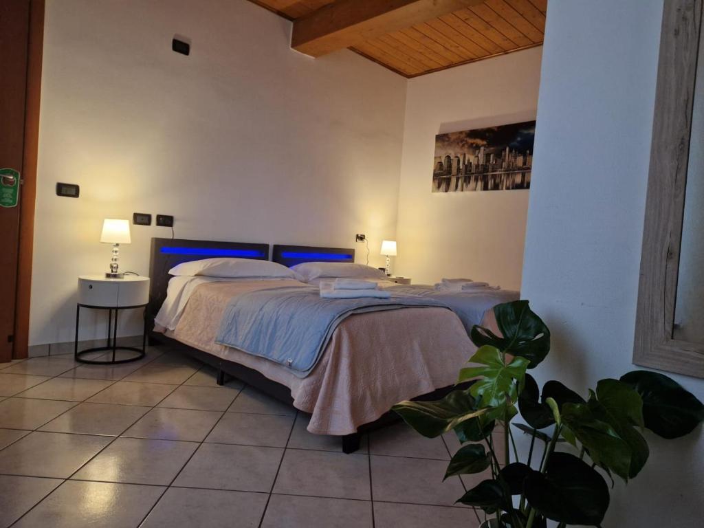 Postel nebo postele na pokoji v ubytování Hotel IL Rifugio