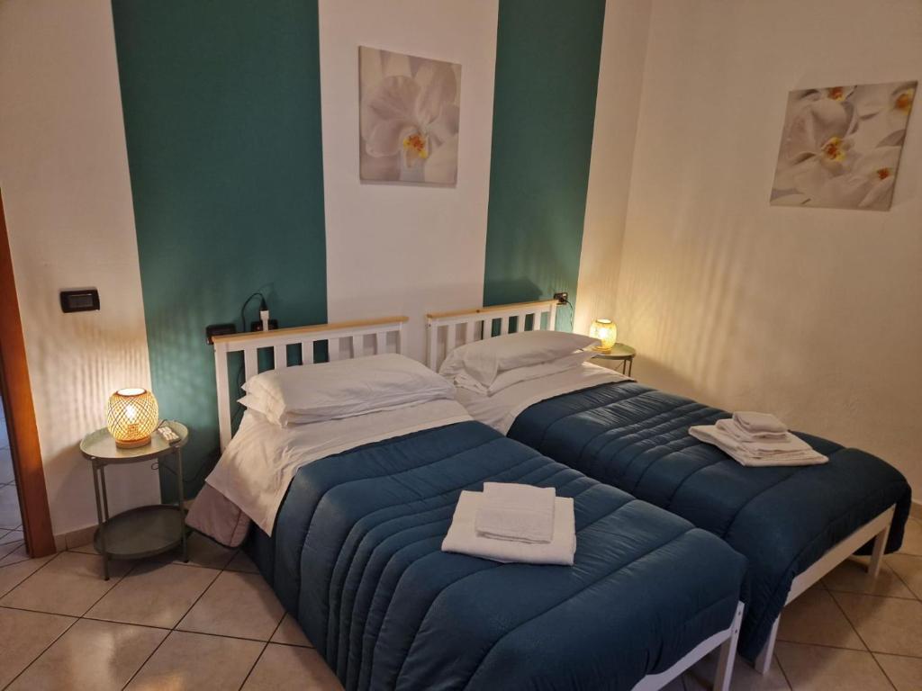 Postel nebo postele na pokoji v ubytování Hotel IL Rifugio