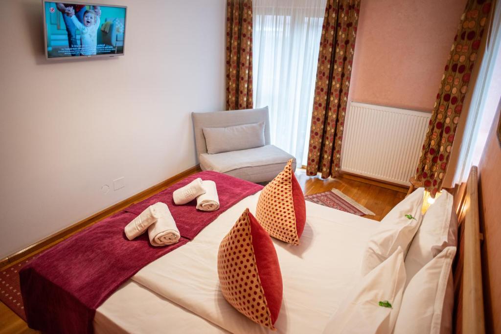 Postel nebo postele na pokoji v ubytování Villa Ermitage