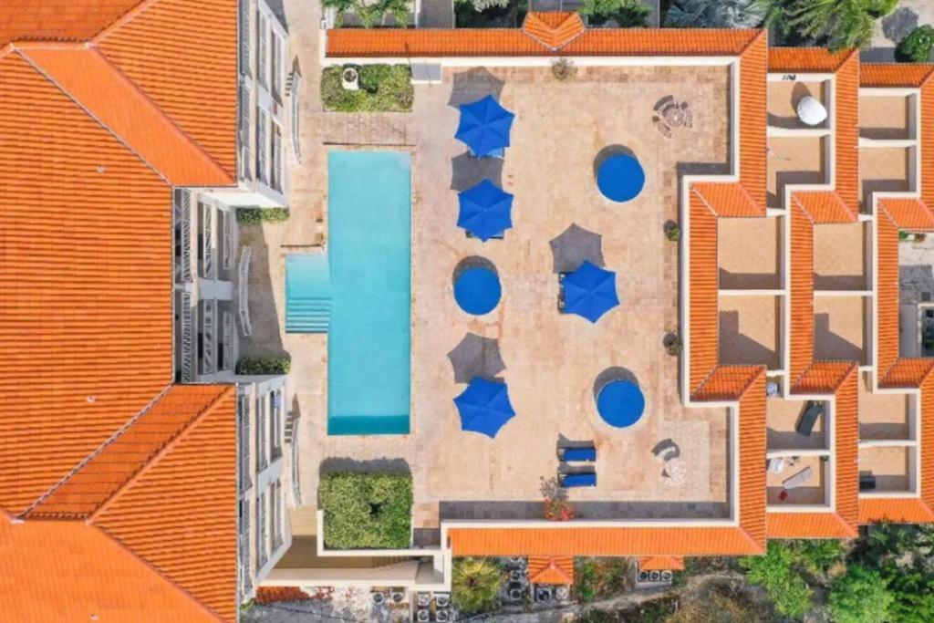 Bazén v ubytování Private Poolside, Loft-Like Condo with Panoramic Grace Bay Views, Walk to Beach, Restaurants, & Turtle Cove Marina! nebo v jeho okolí