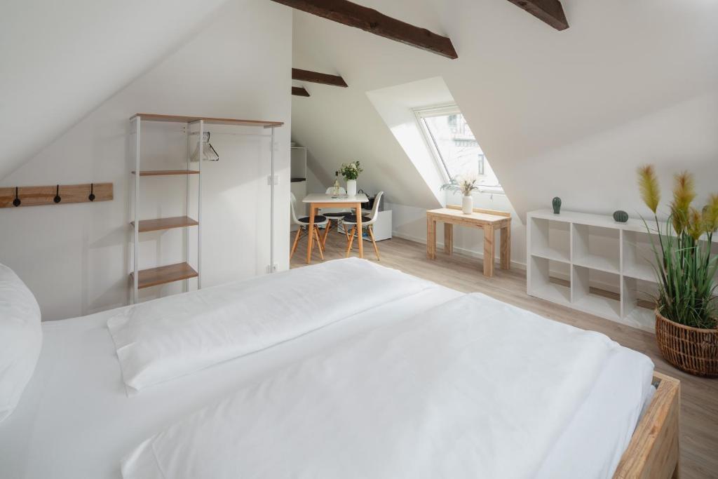 Postel nebo postele na pokoji v ubytování Strandloft VIER Norderney