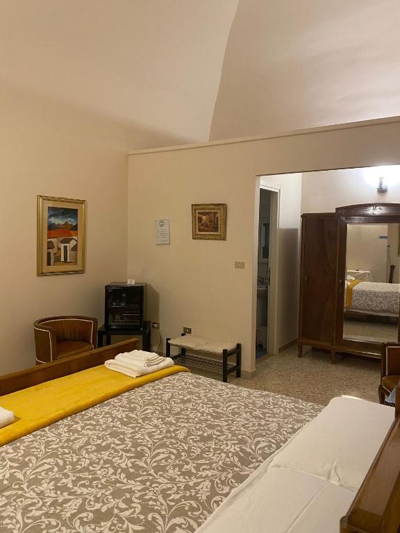 Posteľ alebo postele v izbe v ubytovaní Casa Catalano