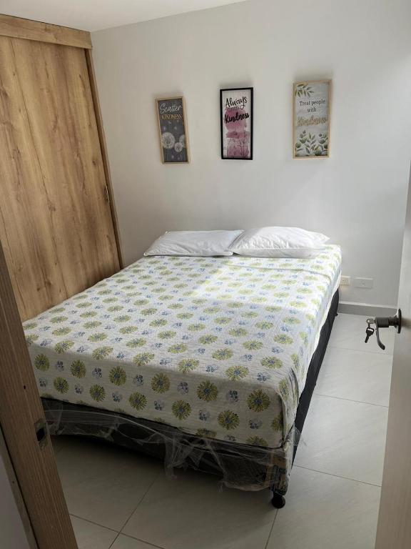 Postel nebo postele na pokoji v ubytování Apartamento Amoblado