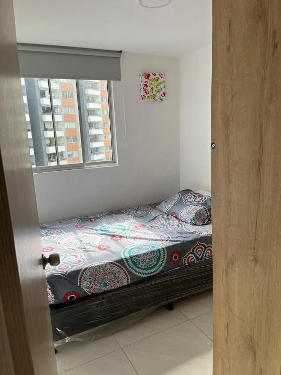 Postel nebo postele na pokoji v ubytování Apartamento Amoblado