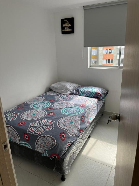 Postel nebo postele na pokoji v ubytování Apartamento Amoblado
