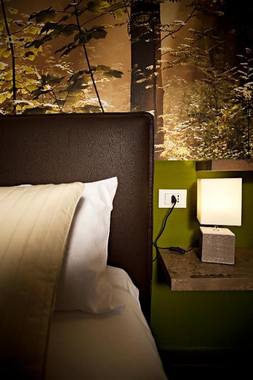 Postel nebo postele na pokoji v ubytování B&b Igea 50