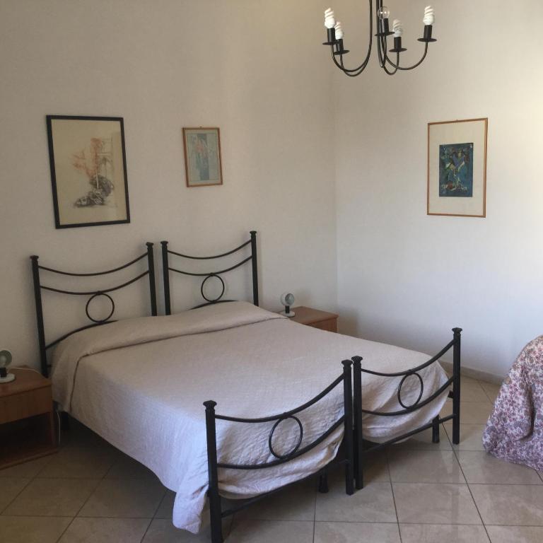 Postel nebo postele na pokoji v ubytování Hotel Touring
