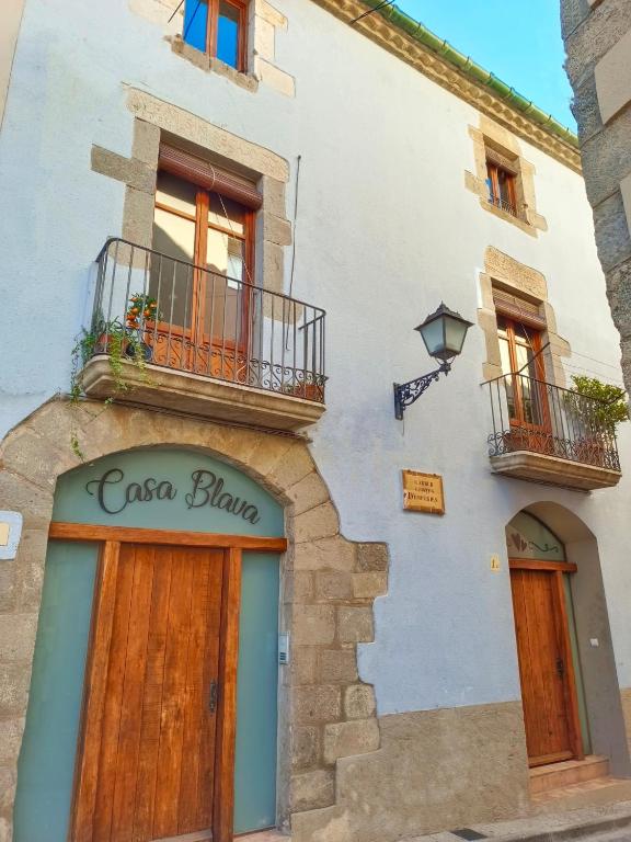 a building with a casa blanca sign on it at Casa Blava in Castelló d'Empúries
