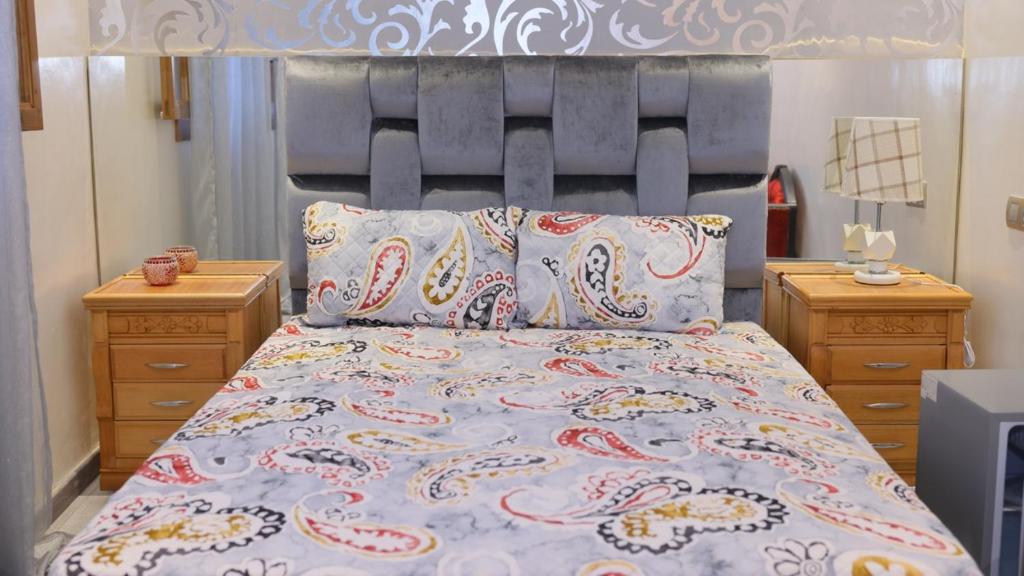 Postel nebo postele na pokoji v ubytování Riad Sevilla
