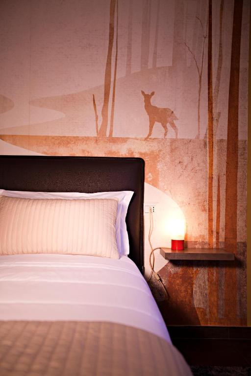 Postel nebo postele na pokoji v ubytování B&b Igea 50