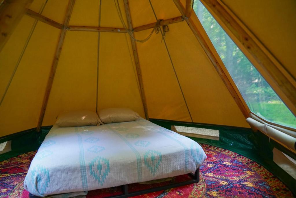 Postel nebo postele na pokoji v ubytování Lenape at Moon Valley Campground
