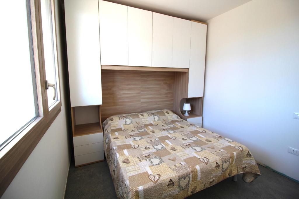 Postel nebo postele na pokoji v ubytování Athesis Lodges