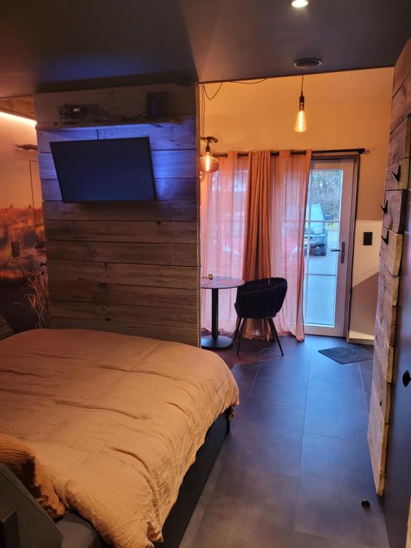 Postel nebo postele na pokoji v ubytování Le Nid des Fa gnes