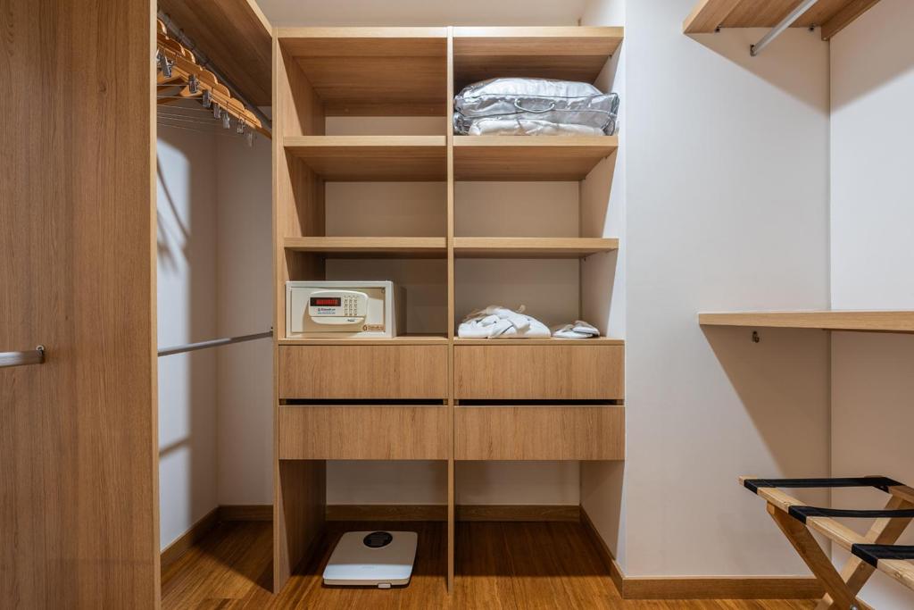 Postel nebo postele na pokoji v ubytování Estelar La Torre Suites