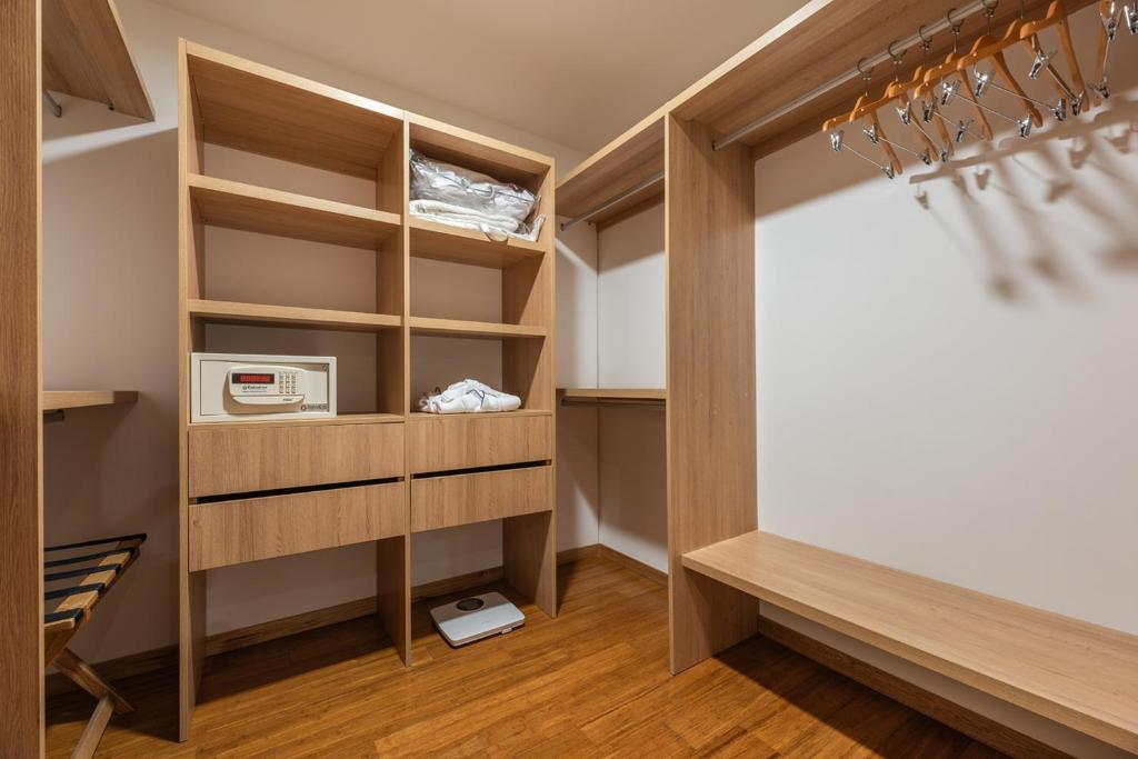 Postel nebo postele na pokoji v ubytování Estelar La Torre Suites