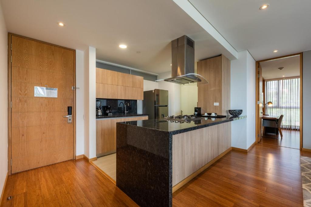 Kuchyň nebo kuchyňský kout v ubytování Estelar La Torre Suites