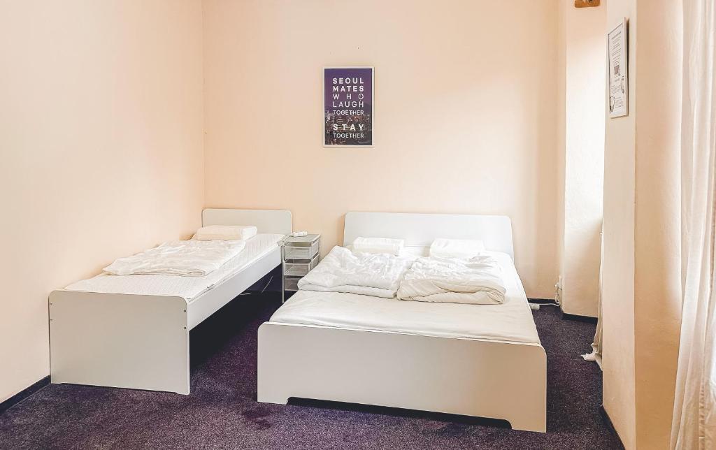 Postel nebo postele na pokoji v ubytování Korea town