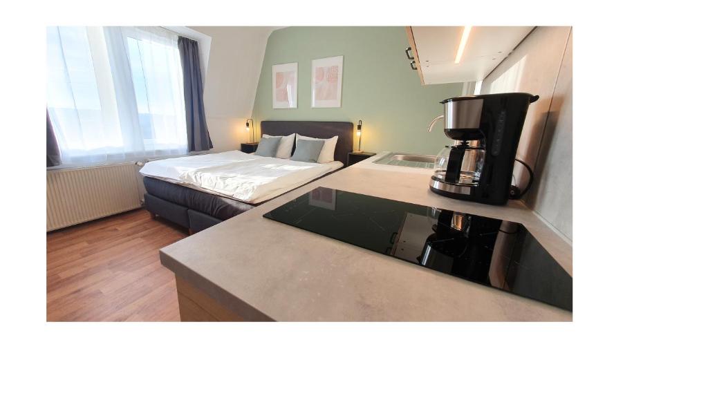 Postel nebo postele na pokoji v ubytování Good Stay Aparthotel mit kostenlosen Parkplätzen
