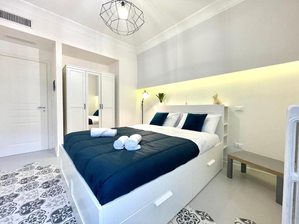 Postel nebo postele na pokoji v ubytování Le porte di Lecce Suites